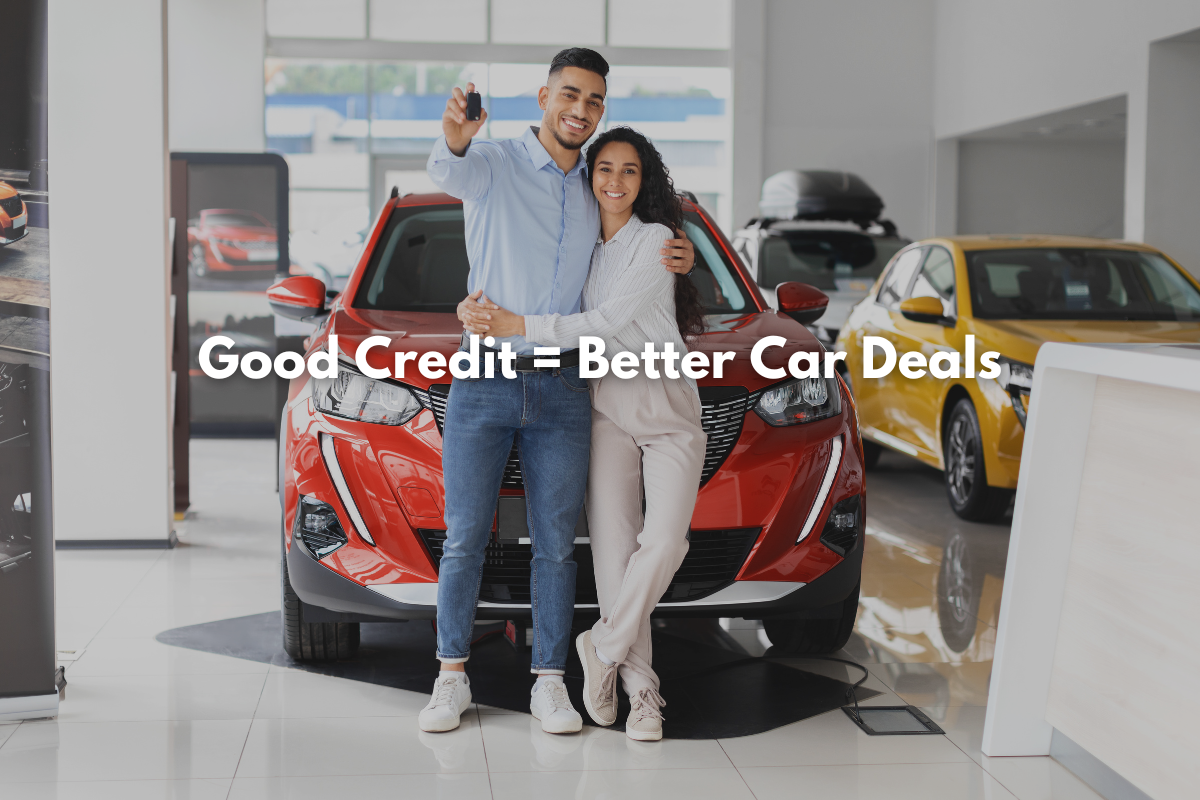 Couple holding car keys after learning what’s a good credit score to buy a car